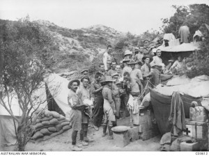 Members of the 1st Field Ambulance receiving mail, Chailak Dere, Gallipoli Peninsula, 1915. Image courtesy Australian War Memorial.
