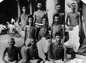 Emaciated Indian forces captured by Turkish forces following the siege of Kut, Mesopotamia, April 1916. Image in public domain.