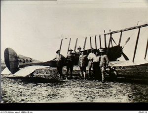 Members of the Mesopotamian Half Flight with a Royal Aircraft Factory BE2c aircraft used by the Australian Flying Corps to supply the Army garrison at Kut-al-Amara, 1916. Image courtesy Australian War Memorial.