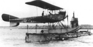 Friedrichshafen FF.29 seaplane on the deck of the German submarine U-12. Image in public domain.