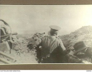 A Navy observer watches the valley behind Gaba Tepe, Gallipoli, 4 May 1915, CEW Bean. Image courtesy Australian War Memorial.