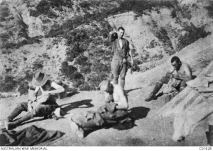 Four unidentified soldiers enjoy the sunshine while delousing their clothing at Gallipoli, 1915. Image courtesy Australian War Memorial.