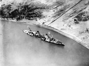Wreck of the SMS Konigsberg in the Rufiji River delta, East Africa, July 1915. Image in public domain.