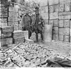 Two soldiers of the Supply Depot, 1st Australian Division, with boxes of corned beef and canned meat, Anzac Cove, 1915. Image courtesy Australian War Memorial.