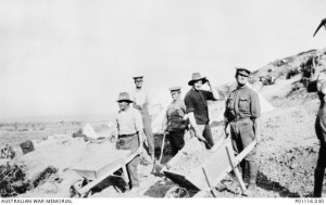 Men of the 4th Australian Field Ambulance move earth as they construct living quarters for the impending Gallipoli winter, 1915. Image courtesy Australian War Memorial.