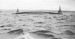 The upturned hull of HMS Natal in Cromarty Firth, 1915. Image in public domain.