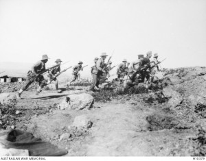 Australian soldiers stage a mock battle for photographic purposes prior to leaving Gallipoli, 18 December 1915. Image courtesy Australian War Memorial.
