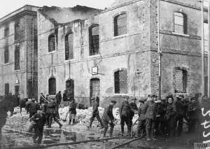 British troops clearing a street in Salonika after a Zeppelin raid, 1 February 1916. The building in the background was a bank. Image courtesy Imperial War Museum © IWM (Q 75979)