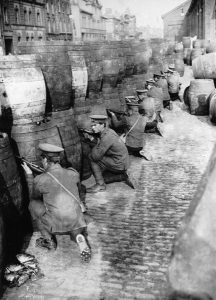 British Regulars sniping from behind a barricade of empty beer casks near the quays in Dublin during the 1916 Easter Rising.   (Photo by Hulton Archive/Getty Images)