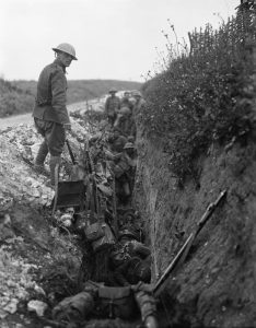 British troops waiting in a support trench shortly before zero hour, Beaumont Hamel, Battle of the Somme, 1 July 1916. Image courtesy Imperial War Museum ©IWM (Q 64).