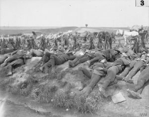 Exhausted British soldiers during the Battle of Bazentin Ridge, Western Front, Rrance, July 1916. Image courtesy Imperial War Museum ©IWM (Q 172).