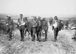 British and German walking wounded en route to a dressing station near Bernafay Wood, following the Battle of Bazentin Ridge, July 1916. Image courtesy Imperial War Museum ©IWM (Q 1619).