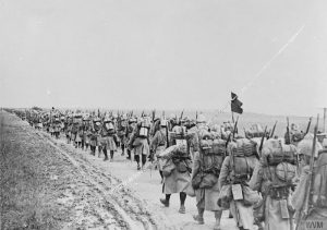 French soldiers marching to the front line near Fleury, 1916. Image courtesy Imperial War Museum © IWM (Q 58153).