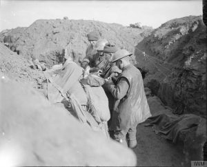 British troops having a dinner in a front line trench, Eaucourt l'Abbaye, October 1916, John Warwick Brooke. Image courtesy Imperial War Museum © IWM (Q 4388).